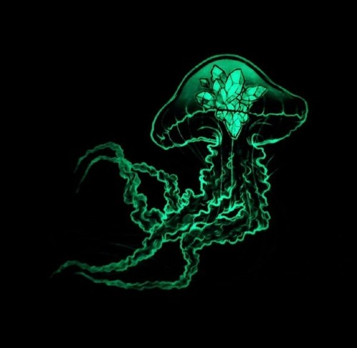 A green jellyfish sticker glowing in the dark