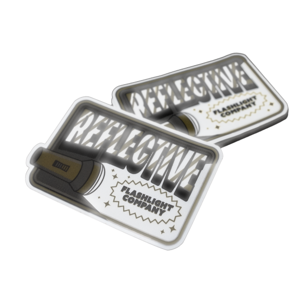Reflecterende stickers met een zaklampdesign, opvallende tekst en het label "Flashlight Company".